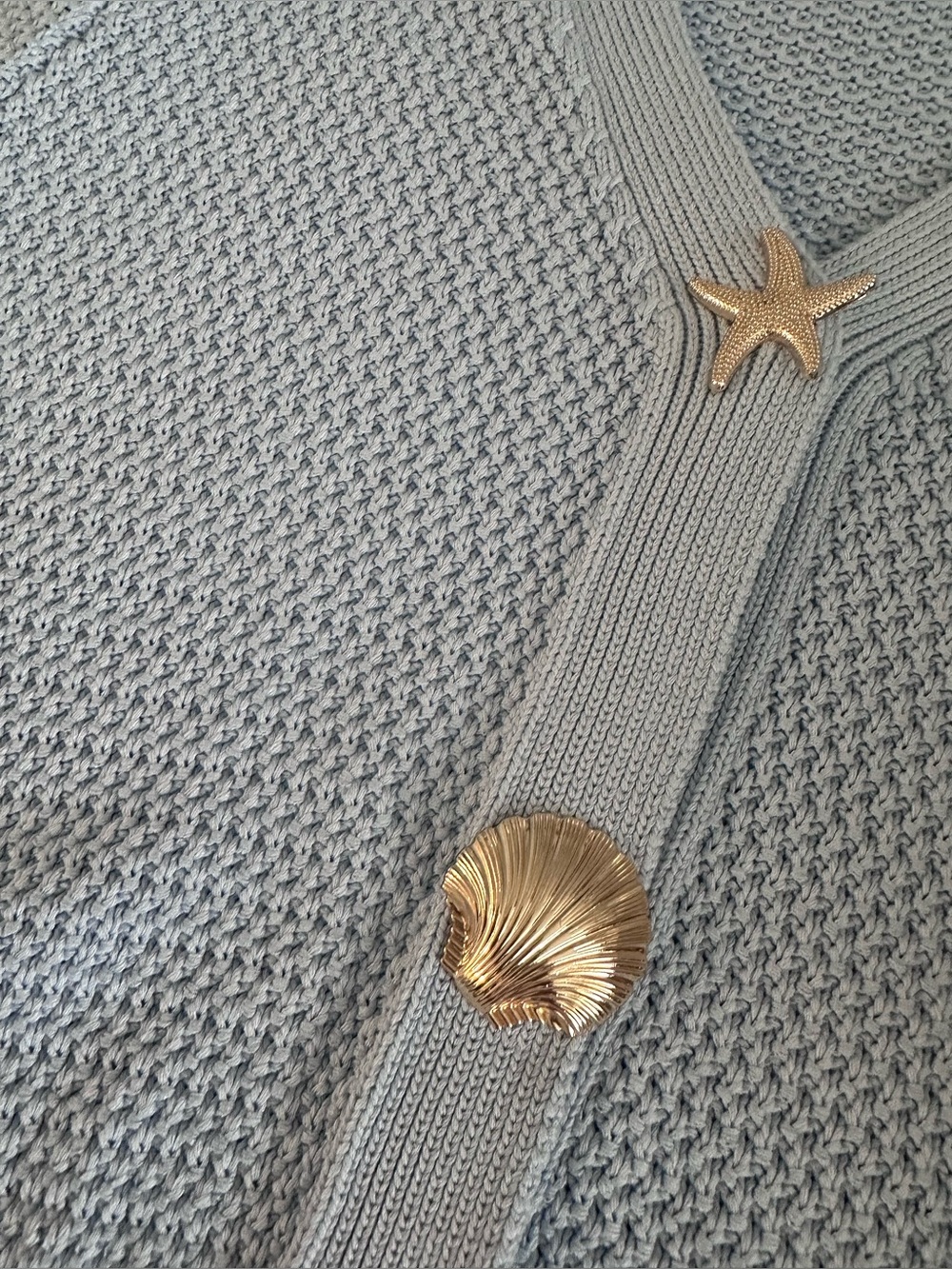 Light Blue Short-Sleeve Knit Cardigan with Shell Buttons
Urban•Daisy - Picture 4 of 4
